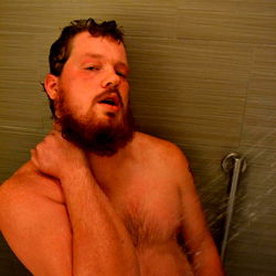 Shirtless Man in Shower