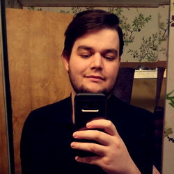 AnthoneyVal - A Bearded Man Taking a Selfie