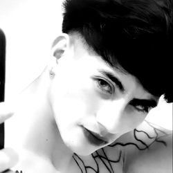 OnlyFans Model Showcasing Personal Style and Tattoos