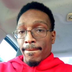 Wisconsin Man in Red Hoodie with a Genuine Expression