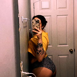 OnlyFans Model AJ Posing in Bathroom Mirror