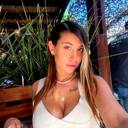 Tina 🍒, a USA model posing for the camera