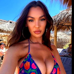 Natty Zach, Onlyfans Model, on a beach in Australia