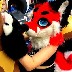 Colorful Alistair King Wonder Cosplay at a Con