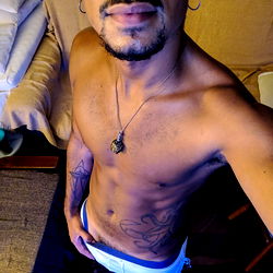 Mateo, An OnlyFans Model in a Tightly Fitted Swimsuit, Strikes a Pose 🏊‍♂️