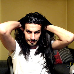 OnlyFans Model Alex Luci Showcasing Hair Routine in Room