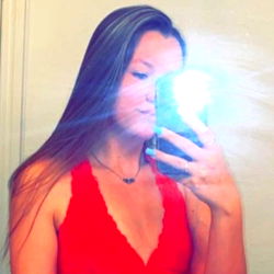 Model Alexis poses for an OnlyFans photo