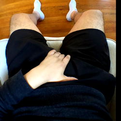 A Model's Leg Crossed Over Their Stomach