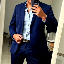 Suited Man in a Mirror