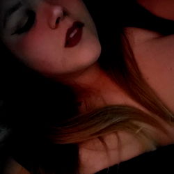 Amber Lilly, the captivating OnlyFans model in a mesmerizing red dress