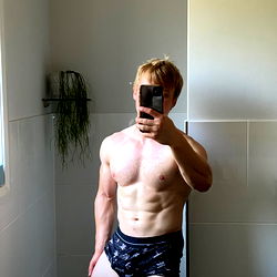 Charles, an Australian OnlyFans Model in a Bathroom Mirror Shot