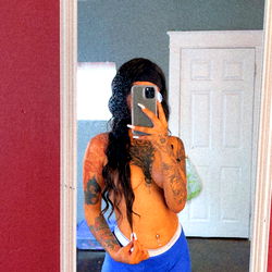 Azula, an OnlyFans model sharing a mirror selfie