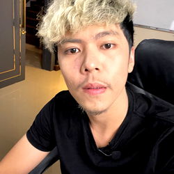 Modern, Young Asian Man Smiling for the Camera