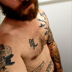 Asquush, a Tattooed Model with a Strong Presence in Oklahoma