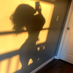 Trippy Shadows: A Model's Artful Transformation