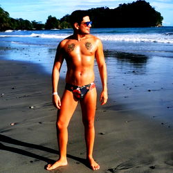 Fitness Model Alex Montenegro Poses on Beach