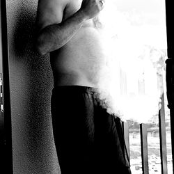 Smoking Man by Window