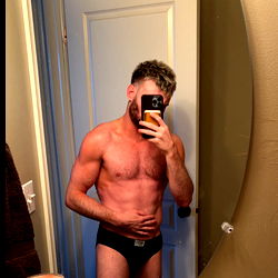 Man Taking Selfie in Mirror