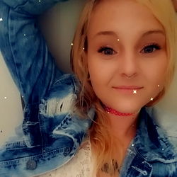 Moonbaby, a young adult female with a distinct fashion sense and a playful demeanor.