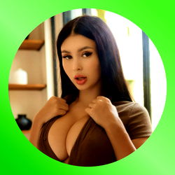 Abby, OnlyFans Model, in Brown Blouse with Cleavage