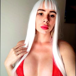 Red-haired beauty in white wig