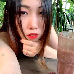 Amida Nichie captures a moment of relaxation in an outdoor setting