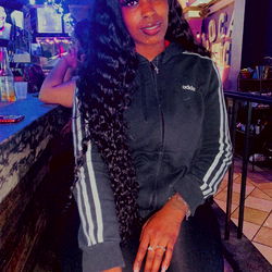 Stylish OnlyFans Model Posing in a Bar