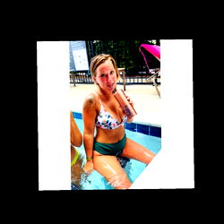 Ashley, a young woman posing in a pool