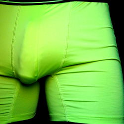 Neon-lit OnlyFans model showcasing athletic wear and impressive physique