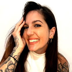 Ivy, Brazilian Tattooed Model with Hand on Face