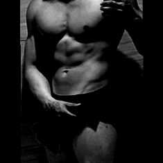 Fitness Model Andrew Tapia Posing for Promotional Material