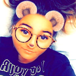 Jessica Trombly Showcases Casual Style with Teddy Bear Filter