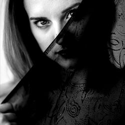 Luna Lovegood: An OnlyFans Model in a Dark and Moody Setting