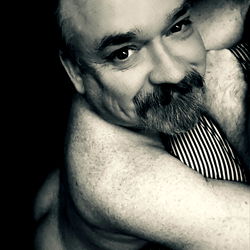 A Shirtless OnlyFans Model with a Tattoo in Atlanta, GA