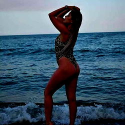 Elegant Alice Spencer: A Romanian Model Striking a Pose on the Beach