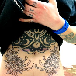 Artful Tattoo Display: Kelsie's Body Art