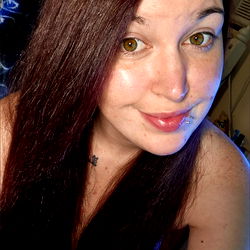 A Woman with Long Hair in a Room