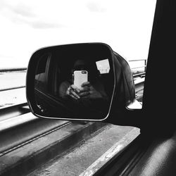 Model Allan's Rearview Mirror Selfie