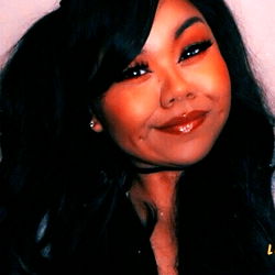 AsianBunnyTail in a candid pose for the camera