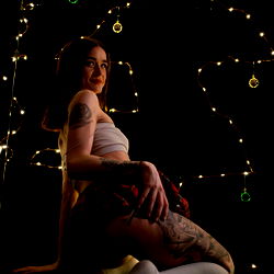 Intimate Moment of Littlekinkybrat in the Holiday Lights