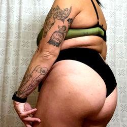 Confident OnlyFans Model in Black and Blue Lingerie