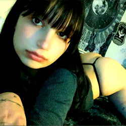 Exotically beautiful woman posing in lingerie