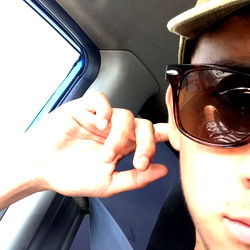 A Young Man Sitting in a Car