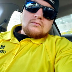 Man in Yellow Uniform with Beard