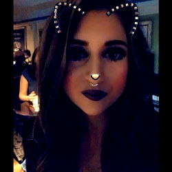 Amber Kingsley in a Playful Cat Ear Headband