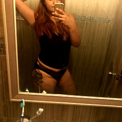 Case, an OnlyFans model, poses confidently