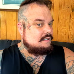 Phoenix Taylor, Tattooed Man with Beard