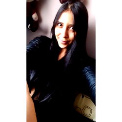 A stylish individual captures a candid moment,