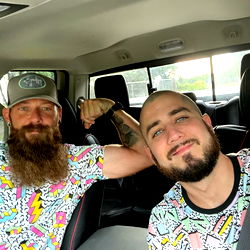 Two Men in Colorful Graphic Shirts