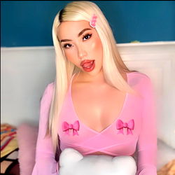 Model in Pink Lingerie and Stuffed Bear